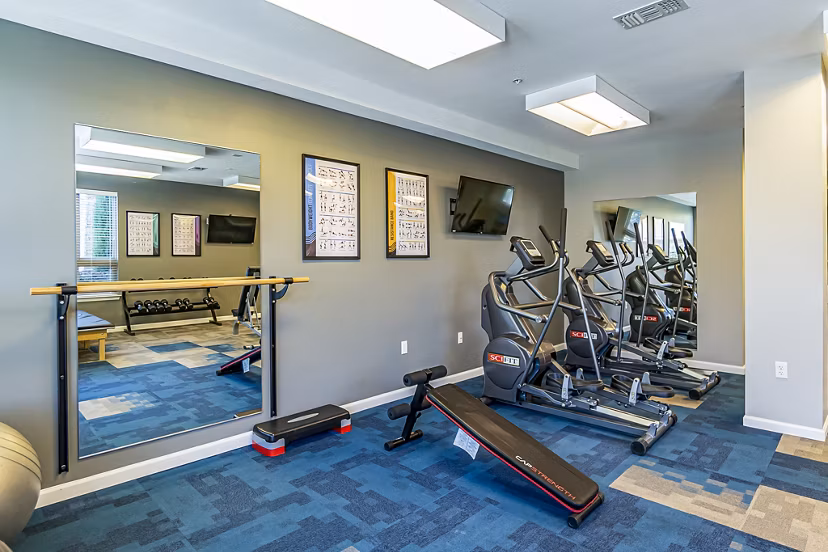 Modern fitness center with state-of-the-art equipment at Album Quail Springs Apartments for a healthy lifestyle