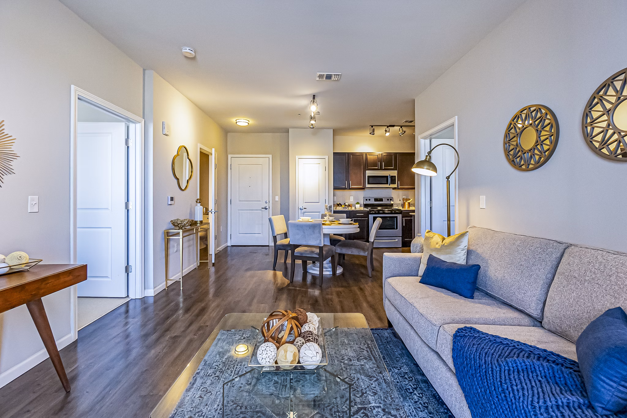 Modern living room with stylish decor and natural light at Album Quail Springs Apartments