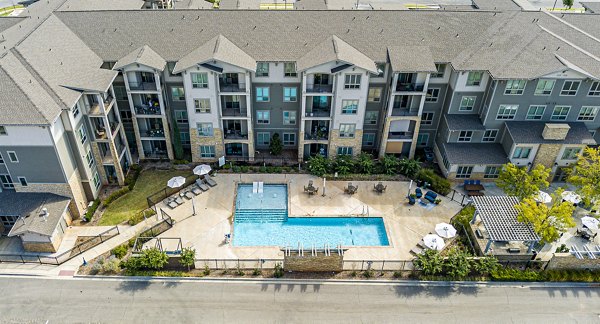 Rooftop pool offering serene views at Album Quail Springs Apartments