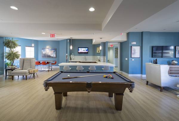 clubhouse game room at Avana on the Platte Apartments