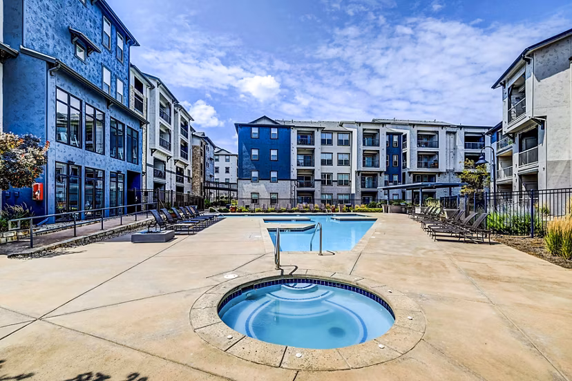 Relaxing hot tub at Avana on the Platte Apartments for luxury living experience