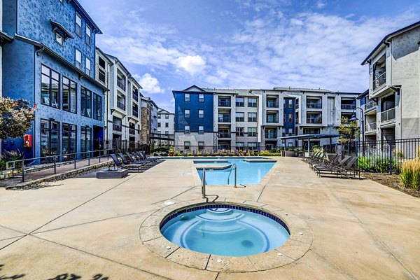 Relaxing hot tub at Avana on the Platte Apartments for luxury living experience
