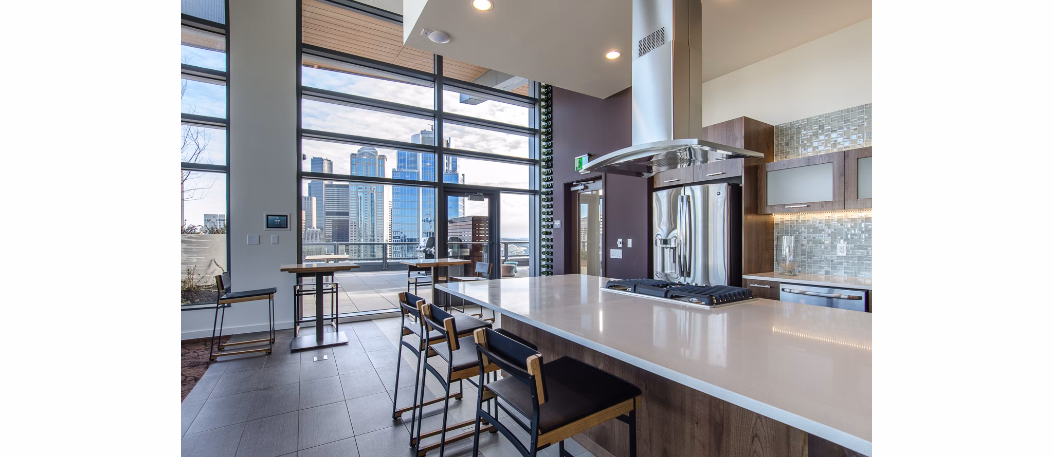 Viktoria Apartments: Modern clubhouse with stylish seating and large TV in luxury community