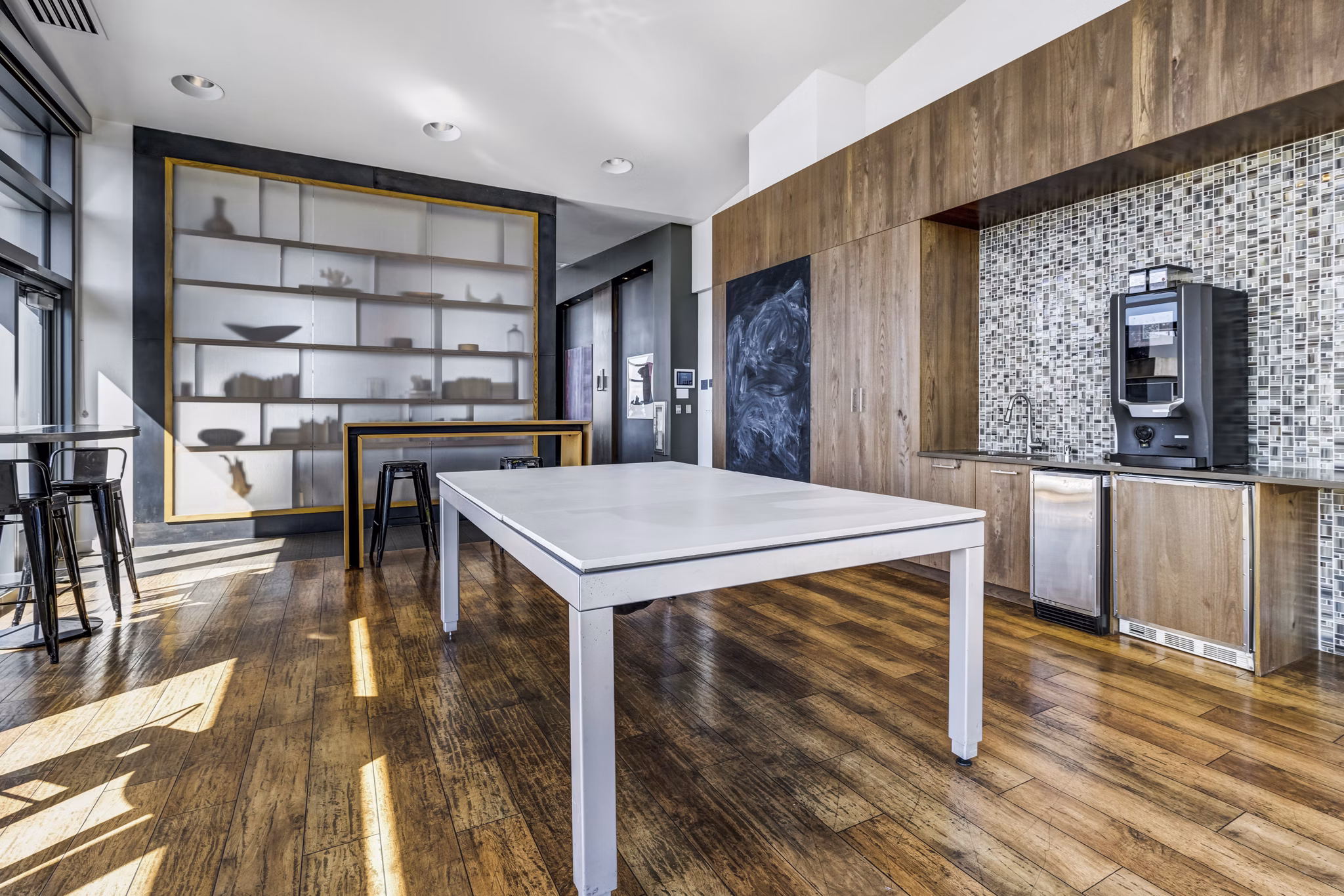 Clubhouse at Viktoria Apartments featuring modern design and cozy seating area in the heart of Seattle's vibrant downtown