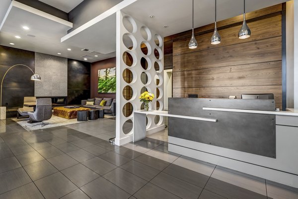 Chic clubhouse with modern decor at Viktoria Apartments, offering luxury amenities for social gatherings