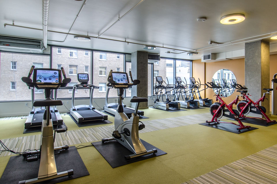 State-of-the-art fitness center with modern equipment at Viktoria Apartments in Seattle, offering a healthy lifestyle for residents