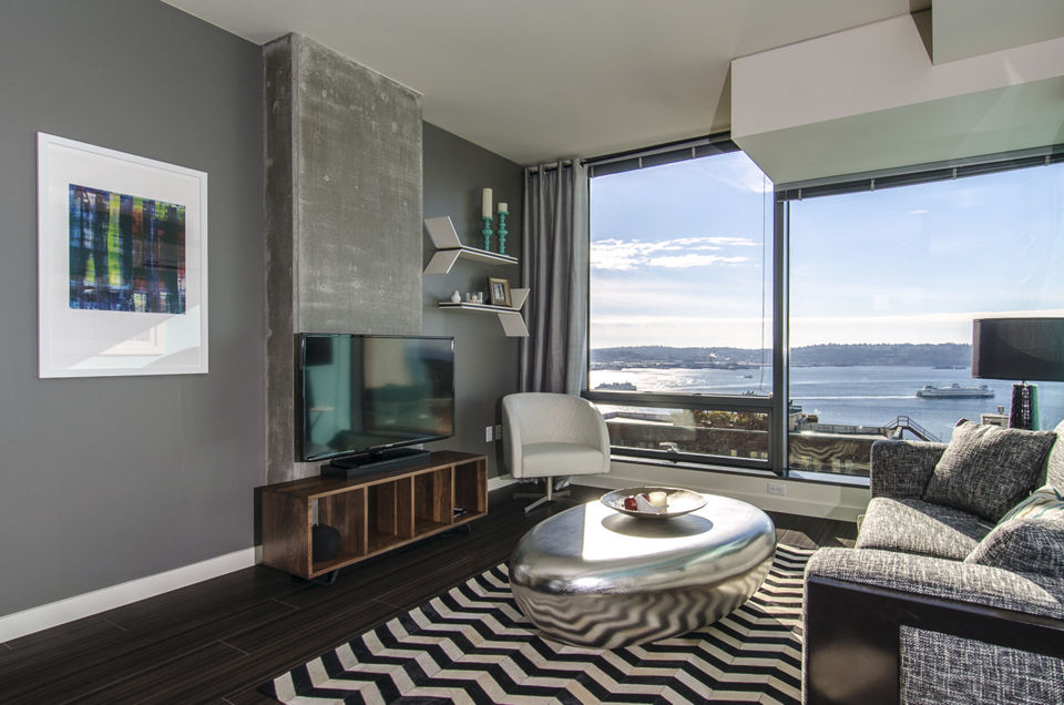 Spacious living room with modern furnishings at Viktoria Apartments in Seattle luxury housing