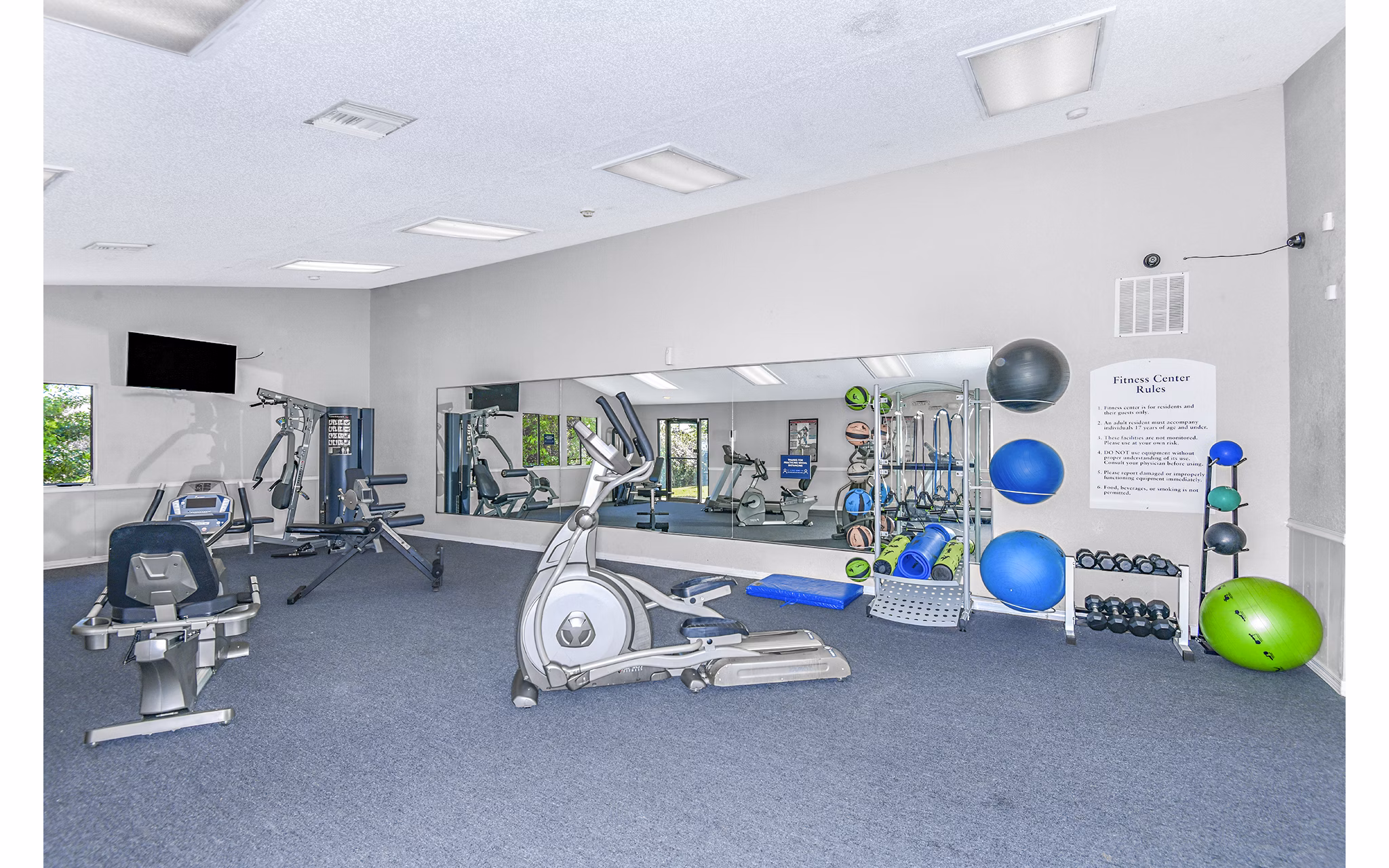 State-of-the-art fitness center with modern equipment at Lakeshore at Altamonte Springs Apartments