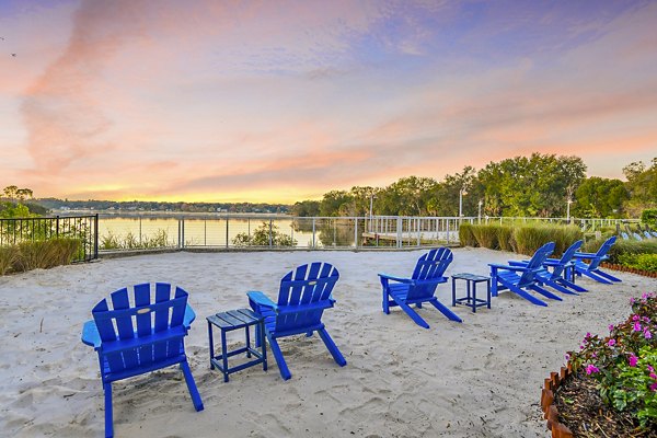 Private patio with serene outdoor views at Lakeshore at Altamonte Springs Apartments