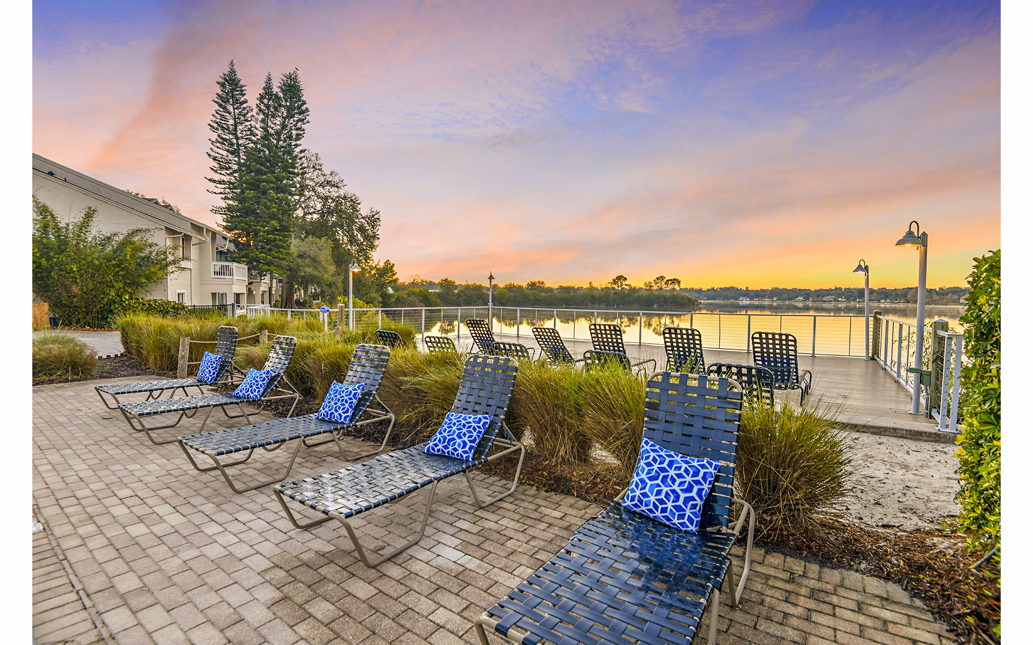 Patio with cozy outdoor seating at Lakeshore at Altamonte Springs Apartments