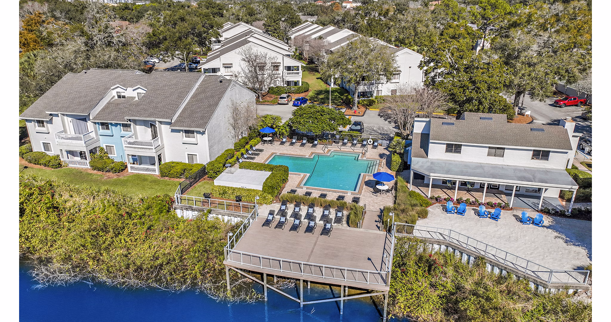 Inviting outdoor pool at Lakeshore at Altamonte Springs Apartments, perfect for relaxation and leisure activities in a luxury setting