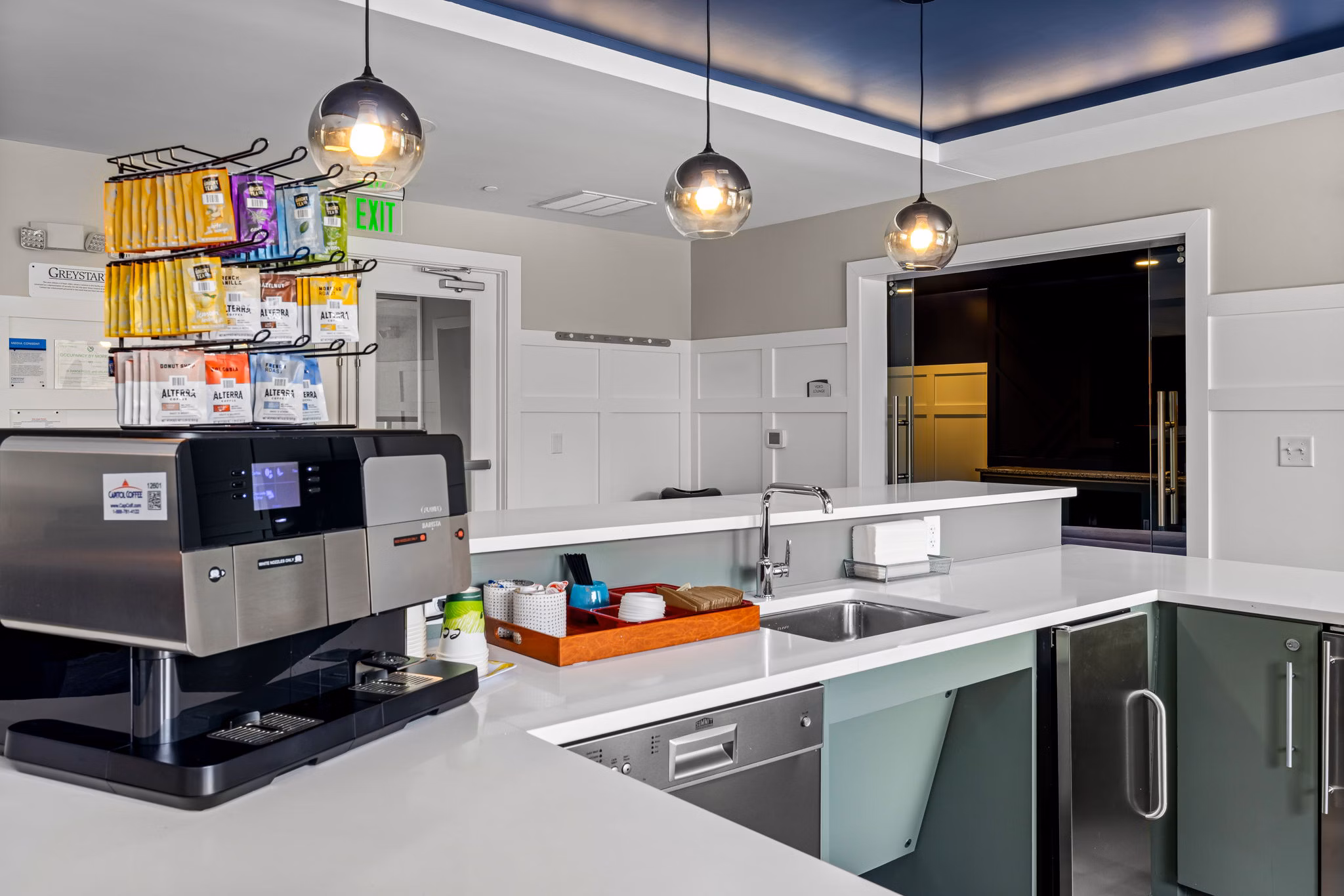 Modern clubhouse with stylish seating and entertainment options at Junction Six Forks Apartments Ideal for socializing and relaxation