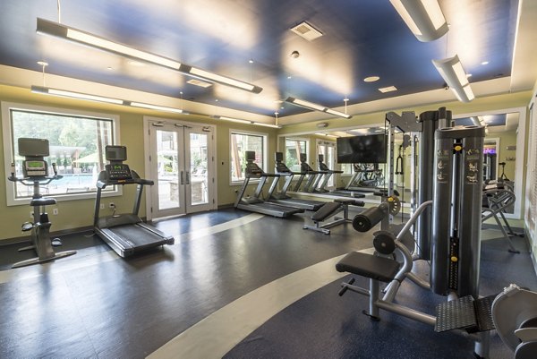 Fitness center with modern equipment at Junction Six Forks Apartments