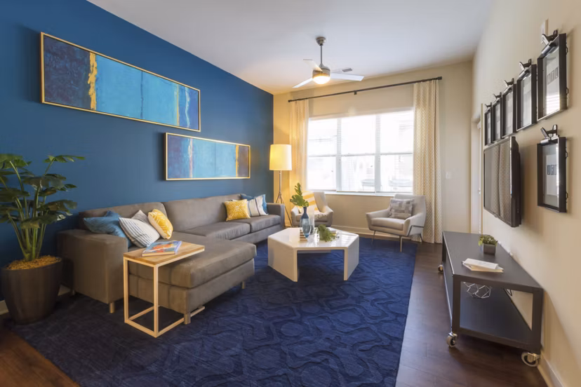 Modern living room with stylish decor at Junction Six Forks Apartments, offering luxury amenities in a vibrant Raleigh community