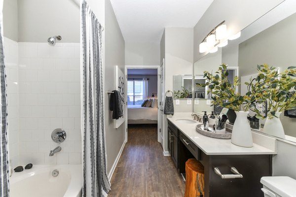 Modern bathroom featuring elegant fixtures at Avana Ridenour Apartments, offering luxury living in the heart of the community