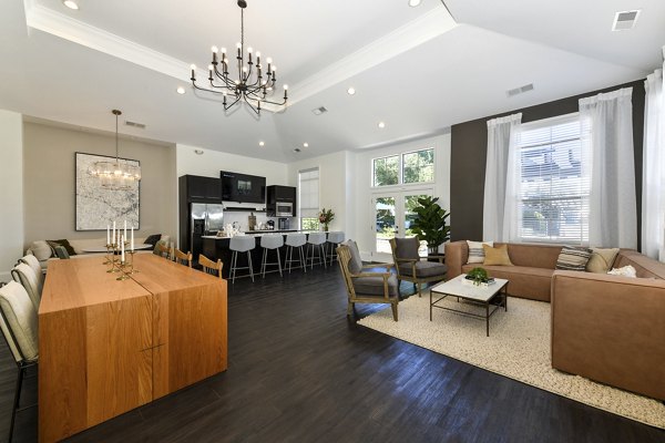 Modern clubhouse featuring spacious seating and stylish decor at Avana Ridenour Apartments