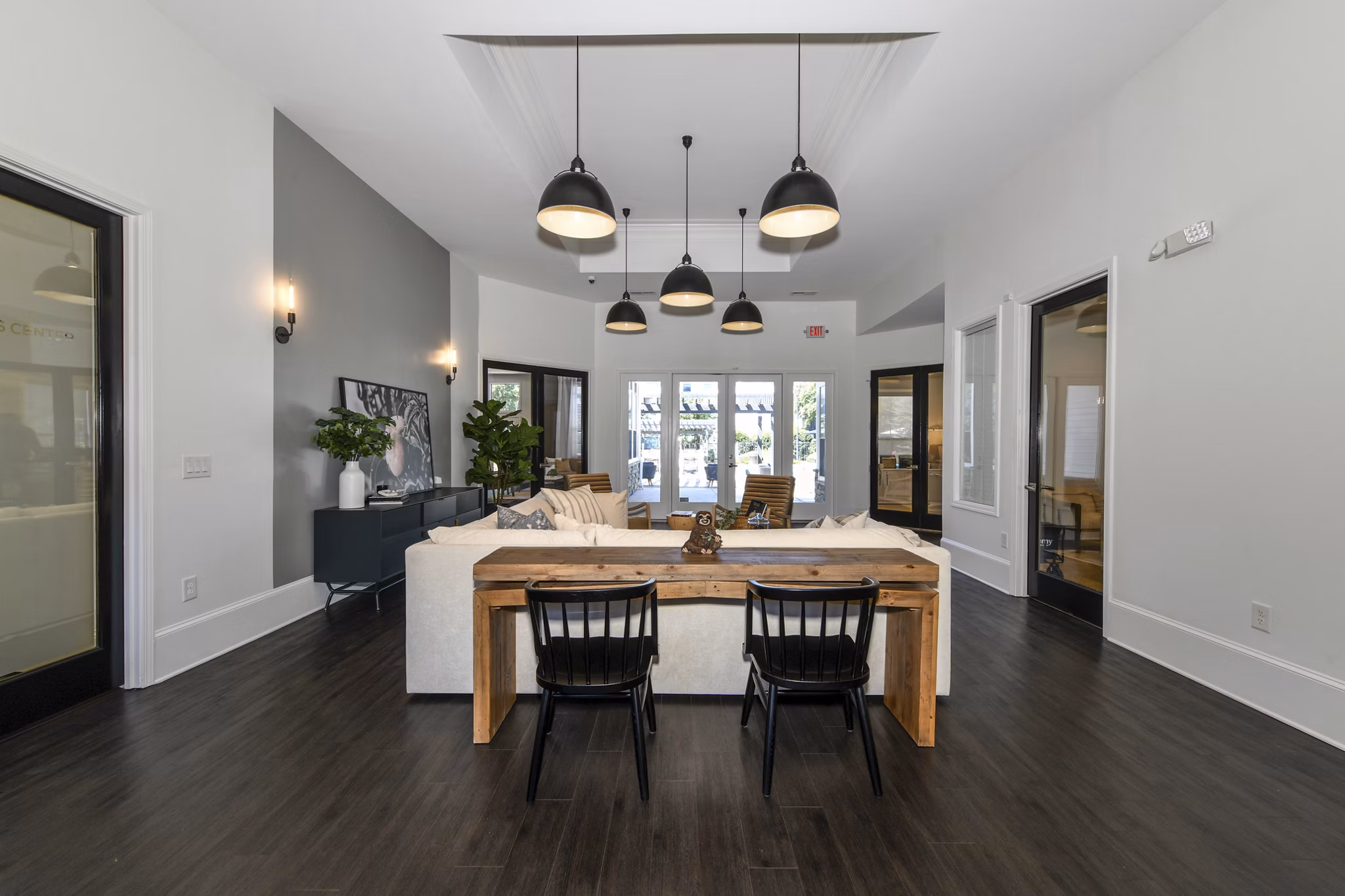 Stylish clubhouse with seating and entertainment options at Avana Ridenour Apartments