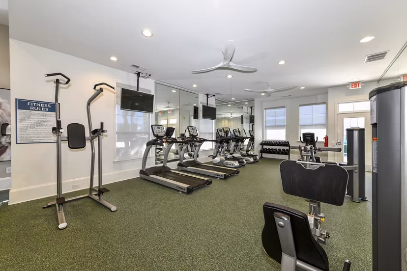 State-of-the-art fitness center at Avana Ridenour Apartments with modern equipment and spacious workout areas