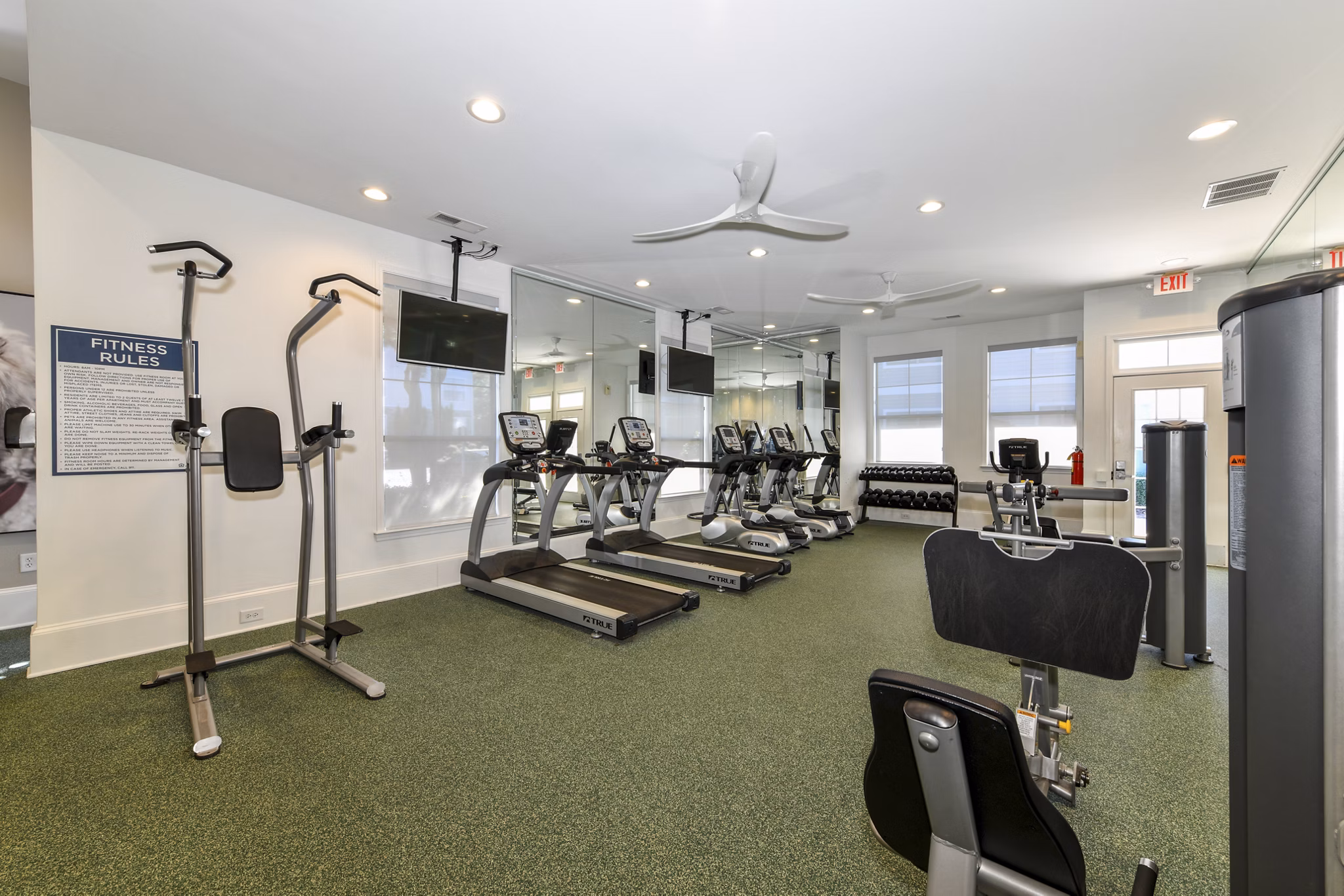 State-of-the-art fitness center at Avana Ridenour Apartments with modern equipment and spacious workout areas