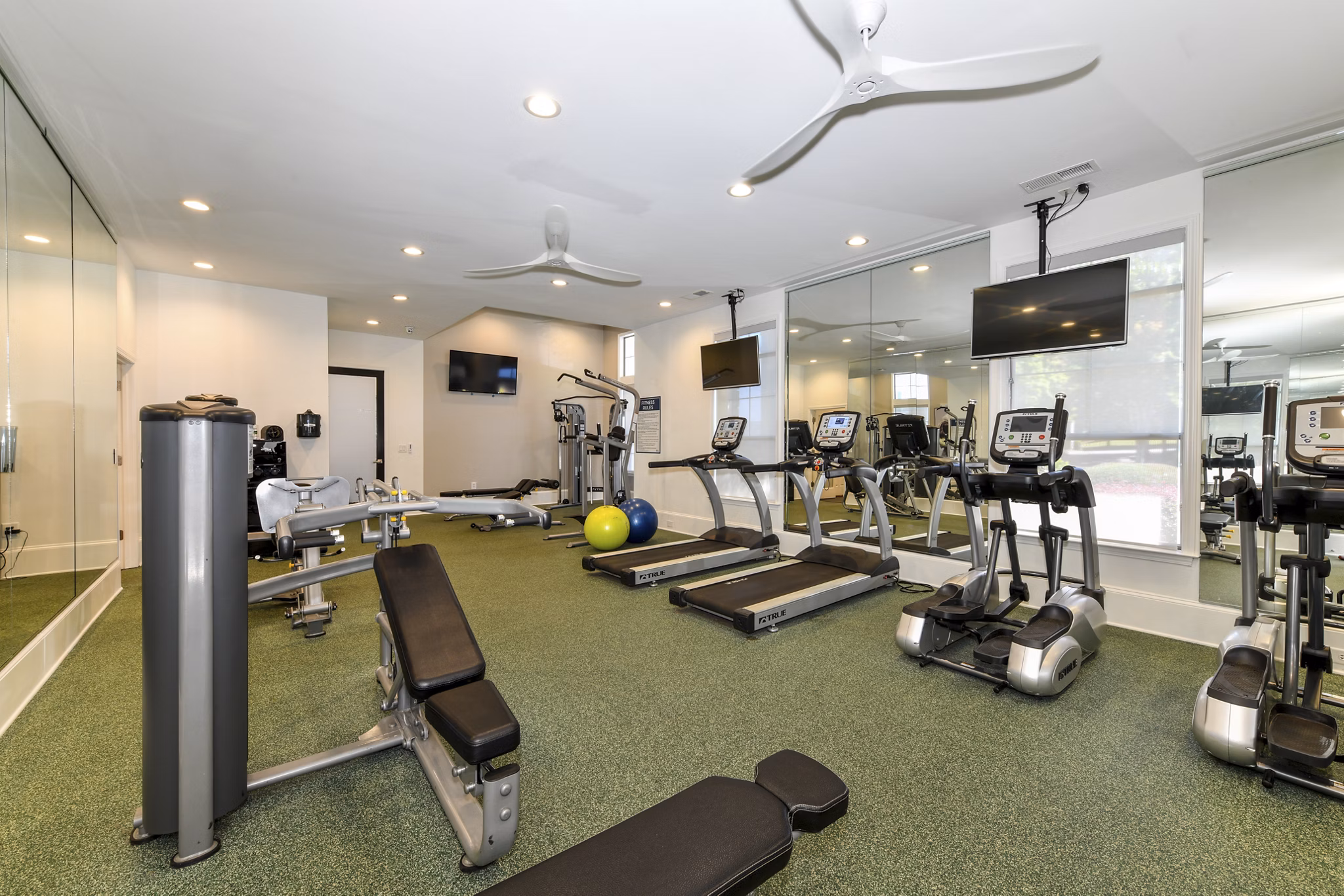 Modern fitness center with state-of-the-art equipment at Avana Ridenour Apartments, luxury living in a vibrant community