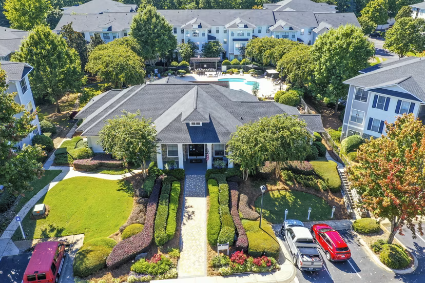 Modern view at Avana Ridenour Apartments showcasing landscaped gardens and contemporary architecture