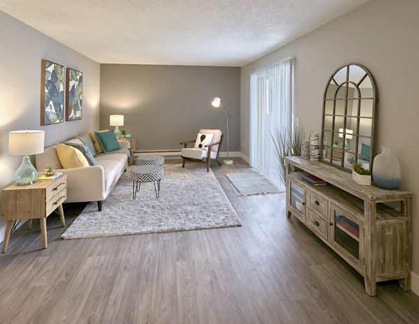 Bright living room with modern furnishings in Irwin Park Apartments, featuring luxury spaces and amenities in Greystar's portfolio