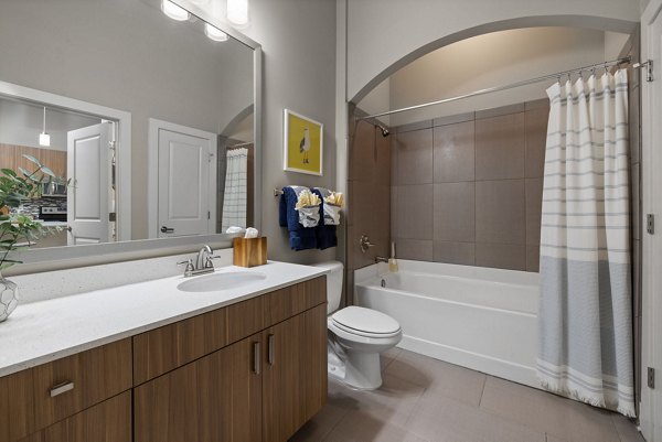 Modern bathroom with sleek fixtures in Elan City Center Apartments