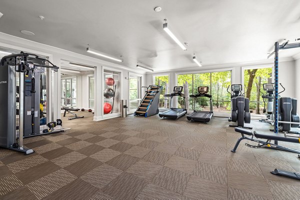 State-of-the-art fitness center with modern equipment at Elan City Center Apartments, a luxury living community