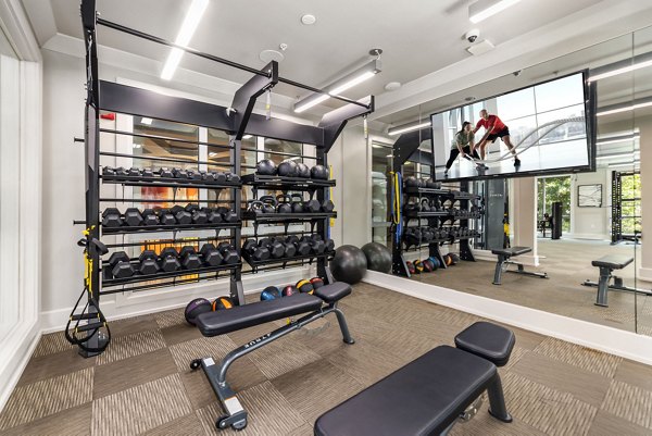 State-of-the-art fitness center featuring modern equipment at Elan City Center Apartments, perfect for residents seeking a healthy lifestyle