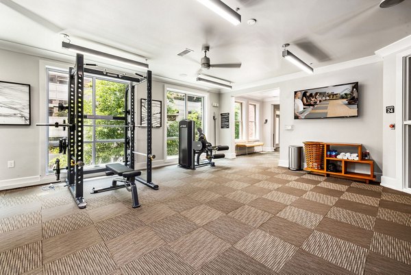 State-of-the-art fitness center at Elan City Center Apartments featuring modern equipment and spacious workout areas in downtown Raleigh