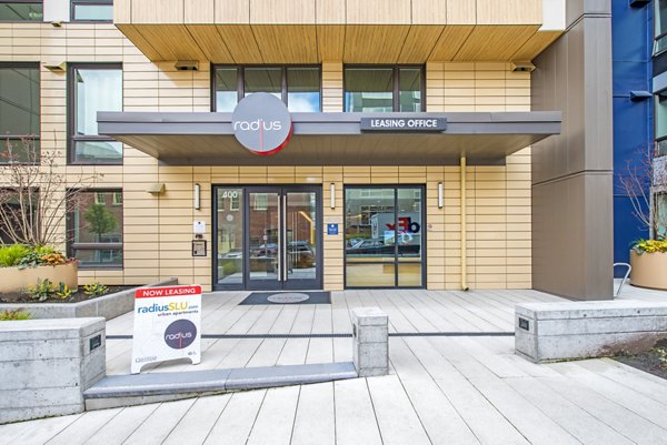 Rooftop patio with modern seating and fire pit showcasing city views at Radius Apartments, a Greystar luxury apartment community