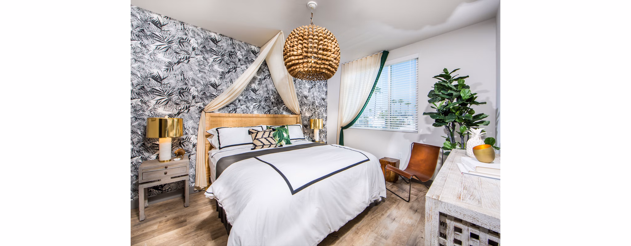 Cozy bedroom with modern decor in Access Culver City Apartments, luxury living in vibrant Los Angeles neighborhood