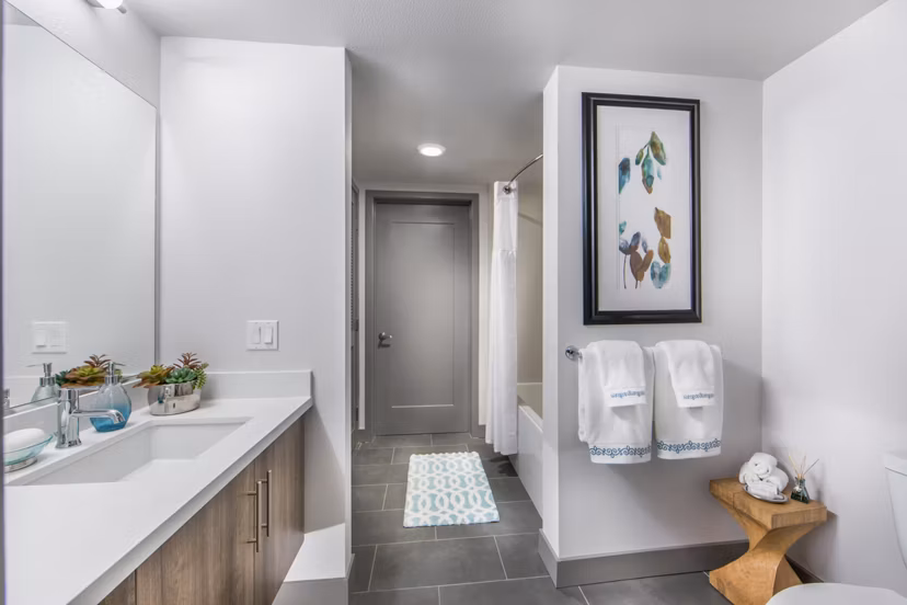 Modern bathroom with designer fixtures in Access Culver City Apartments, offering luxury living spaces