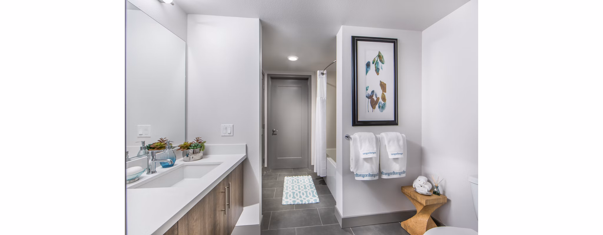 Modern bathroom with designer fixtures in Access Culver City Apartments, offering luxury living spaces