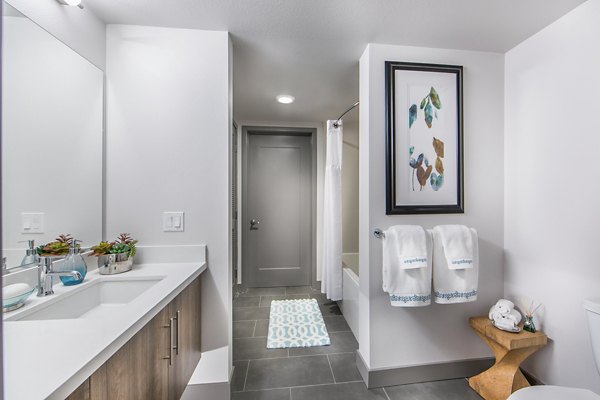 Modern bathroom with designer fixtures in Access Culver City Apartments, offering luxury living spaces