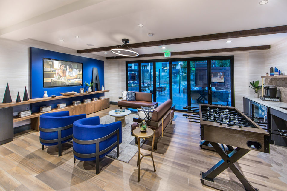 Access Culver City Apartments: Modern clubhouse with stylish seating and communal spaces