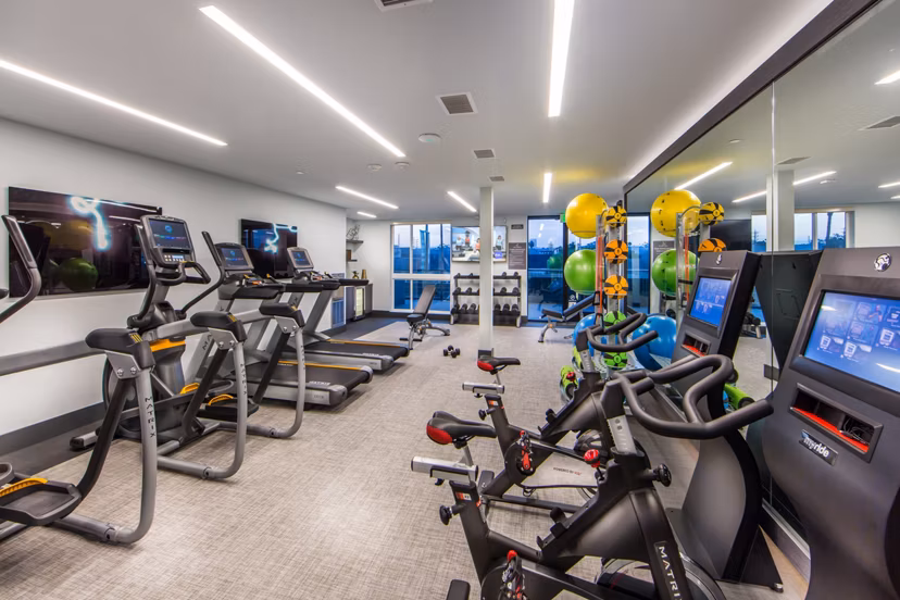 Modern fitness center with state-of-the-art equipment at Access Culver City Apartments