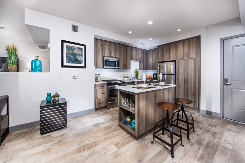 Modern kitchen with stainless steel appliances at Access Culver City Apartments