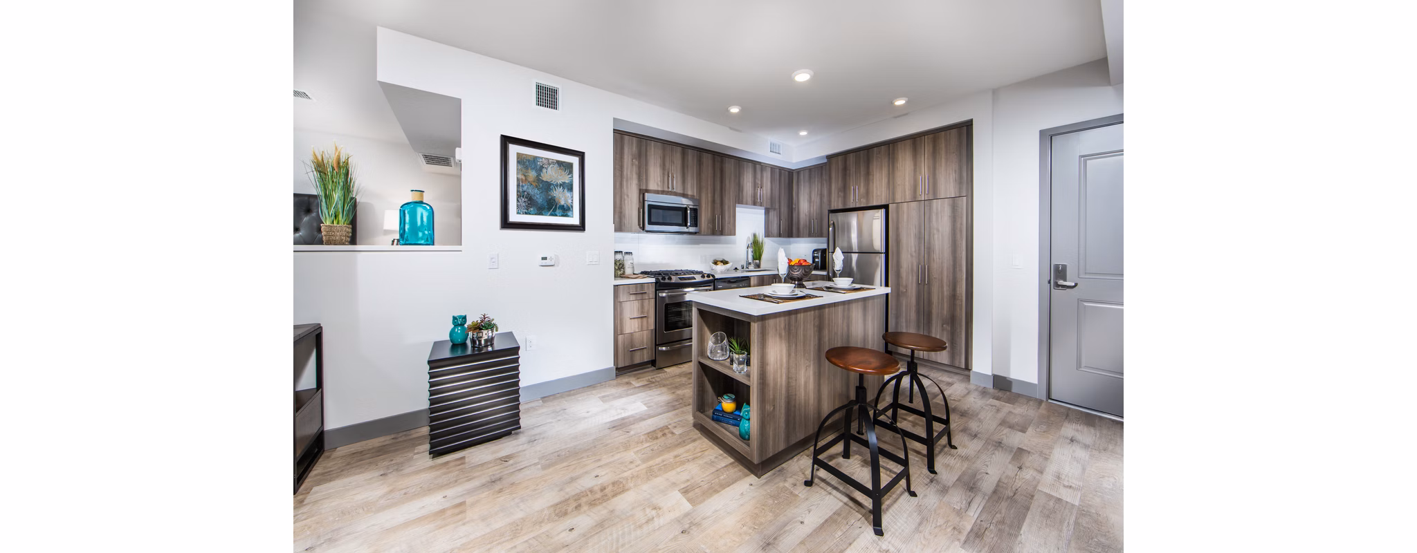 Modern kitchen with stainless steel appliances at Access Culver City Apartments