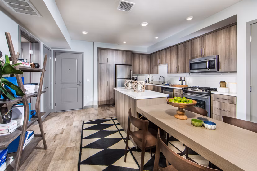 Modern kitchen with stainless steel appliances at Access Culver City Apartments