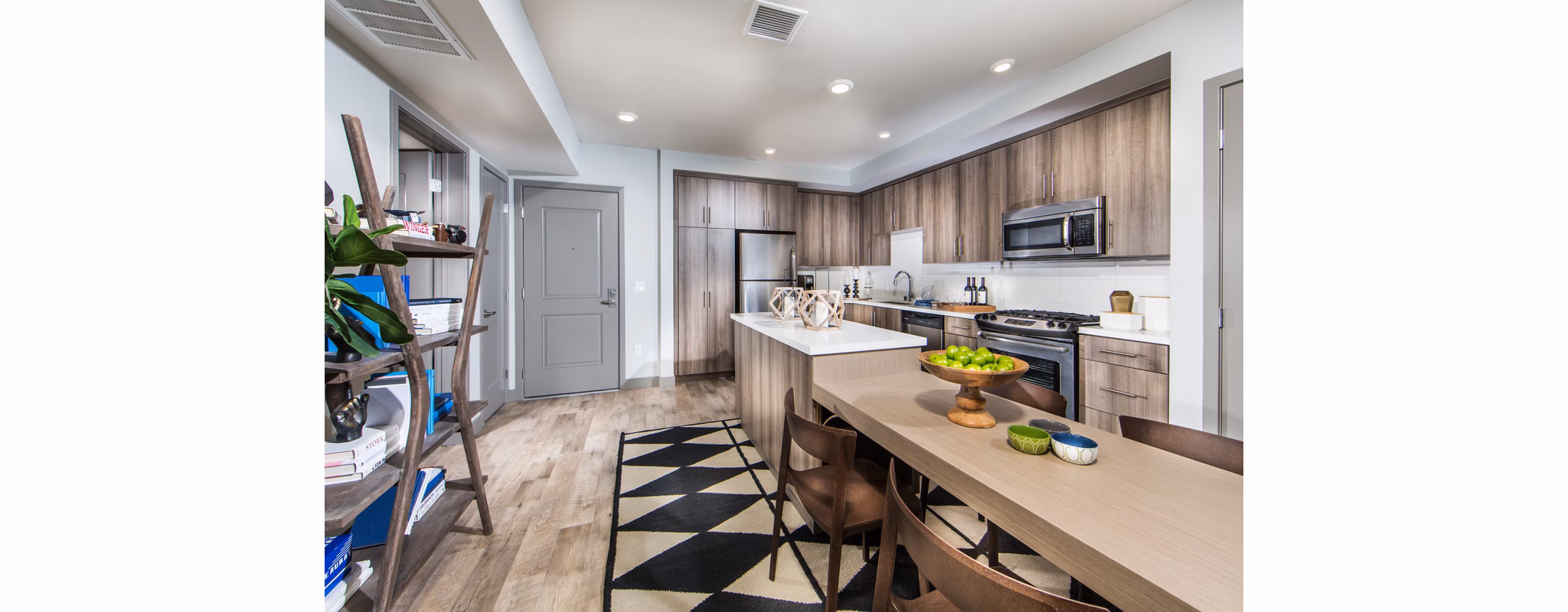 Modern kitchen with stainless steel appliances at Access Culver City Apartments