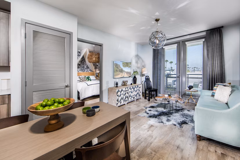 Spacious living room with contemporary furnishings at Access Culver City Apartments, offering luxury and comfort in a prime location