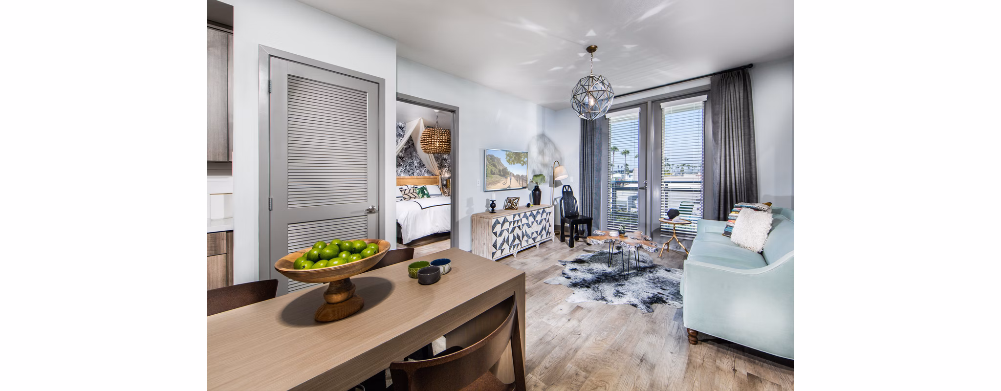 Spacious living room with contemporary furnishings at Access Culver City Apartments, offering luxury and comfort in a prime location