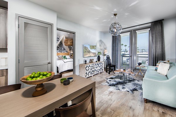 Spacious living room with contemporary furnishings at Access Culver City Apartments, offering luxury and comfort in a prime location
