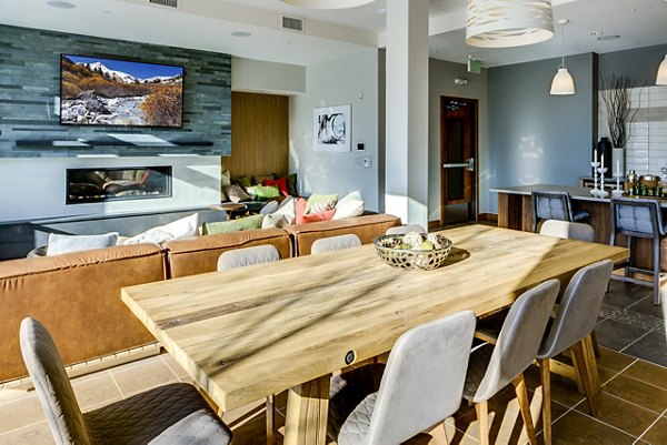 Lobby with modern furnishings and cozy seating at The Island Residences at Carlson Center Apartments clubhouse