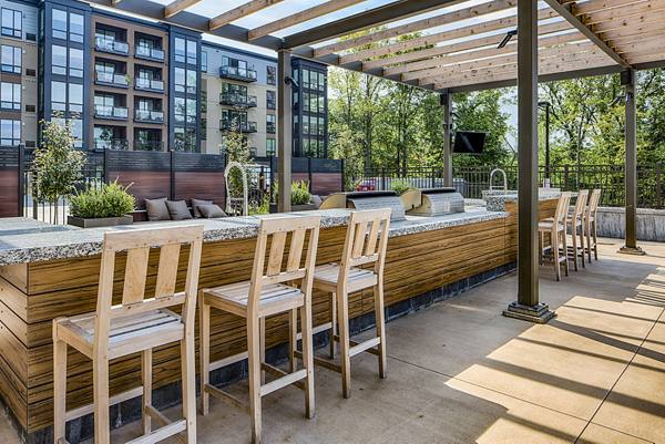 patio/grill area at The Island Residences at Carlson Center Apartments