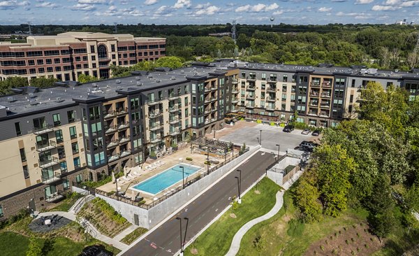 building/exterior at The Island Residences at Carlson Center Apartments