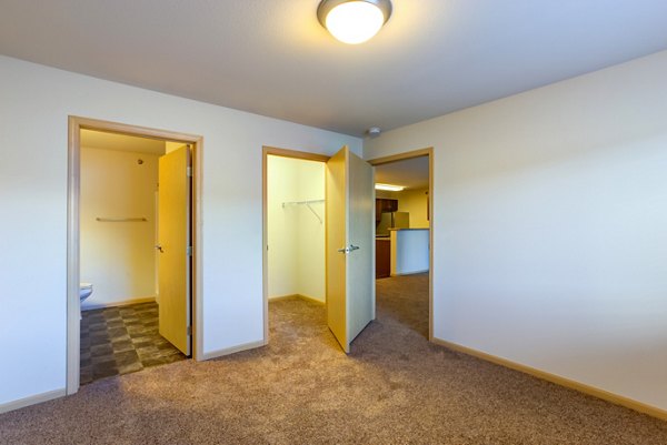 Cozy bedroom with contemporary decor at Eagles Landing Apartments