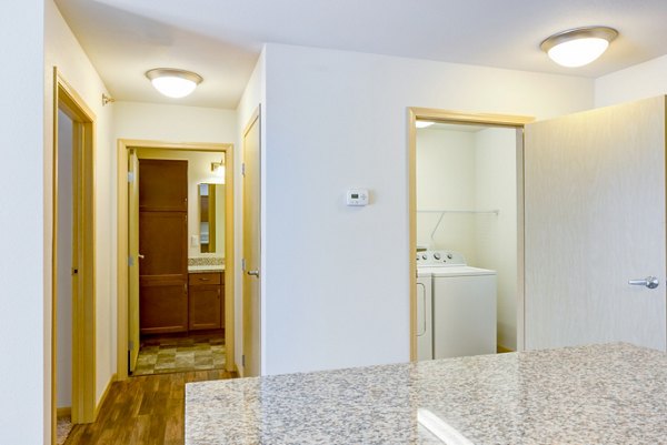 Dining room offering elegant seating and modern dÃ©cor at Eagles Landing Apartments, a Greystar luxury residence