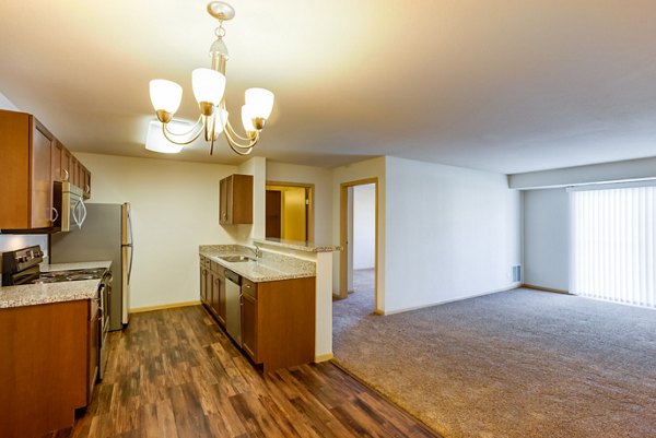 Eagles Landing Apartments: Modern kitchen with stainless steel appliances and granite countertops
